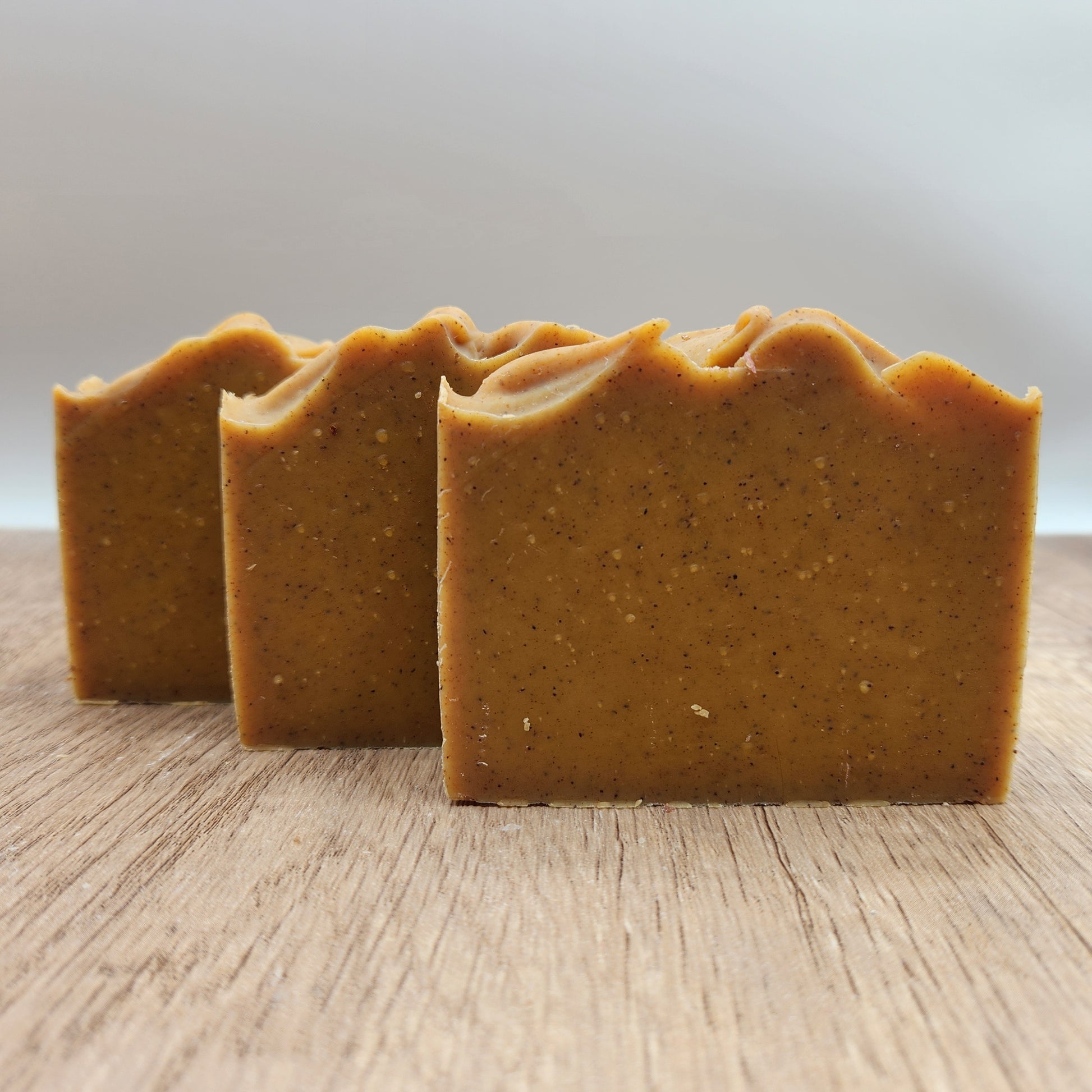 3 bars of goat milk soap with turmeric and apricot seeds added